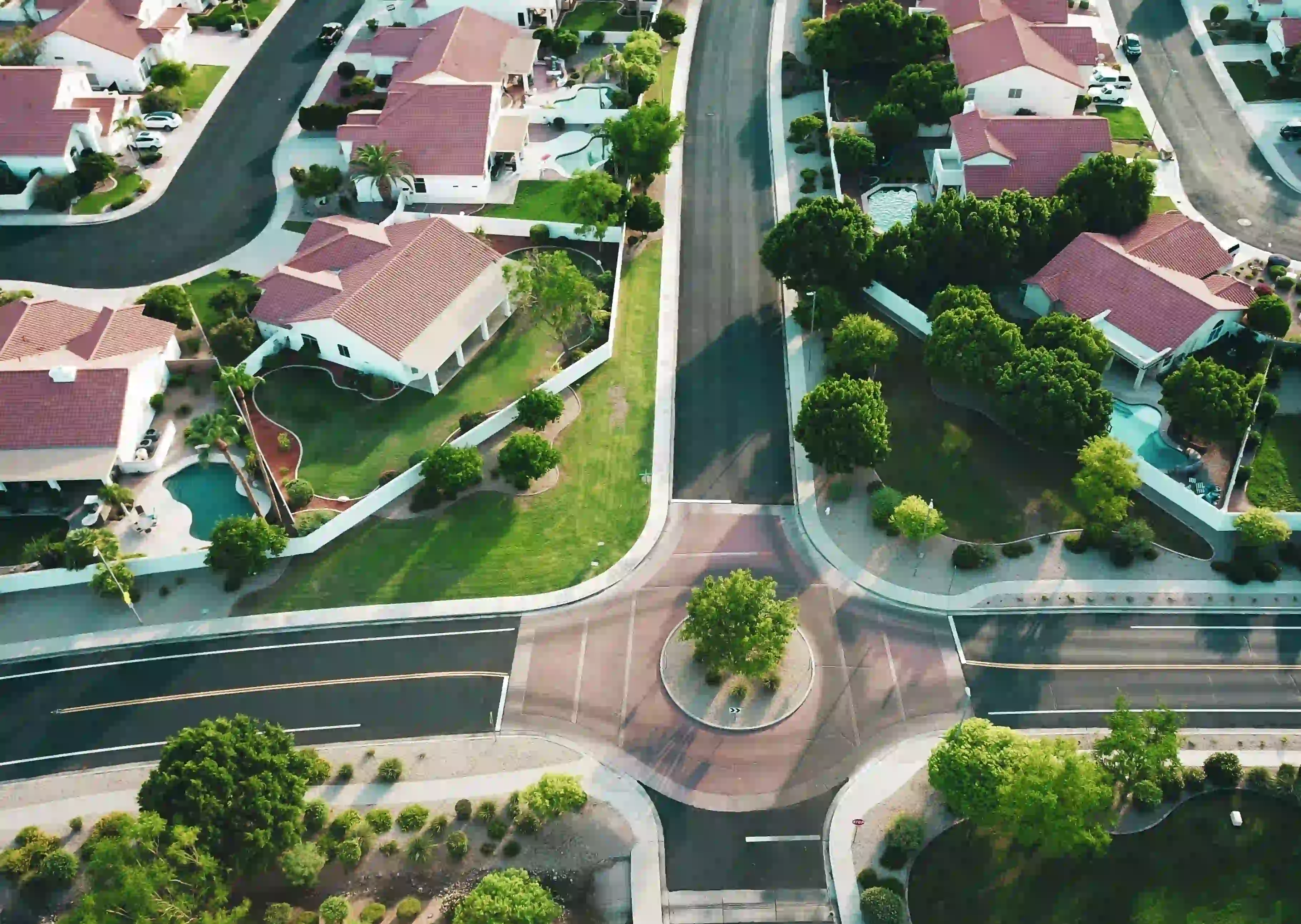 Aerial neighborhood view featuring real estate agent marketing automation tools 2026.