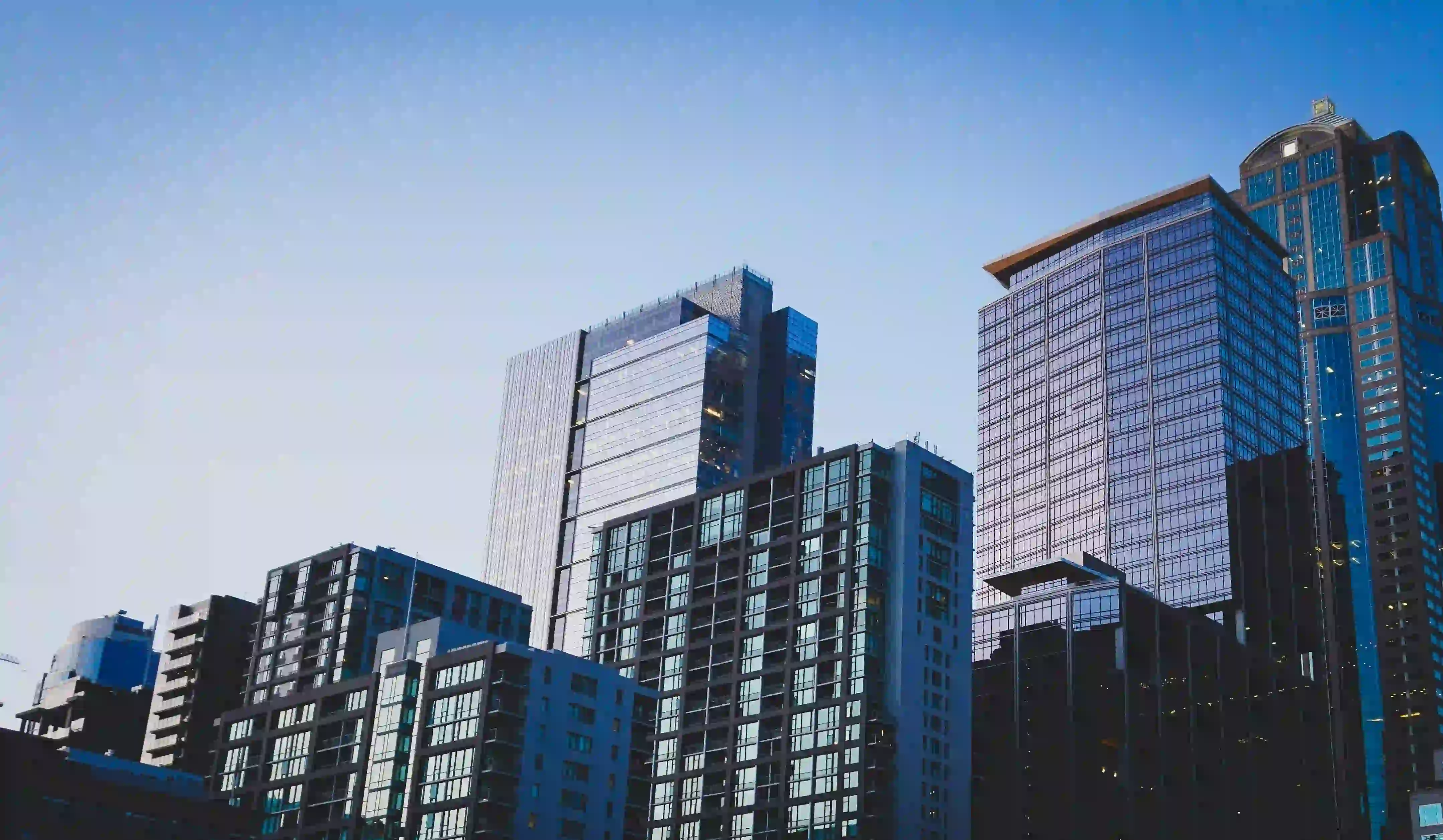 Modern city skyline featuring real estate agent FSBO marketing scripts and tips.