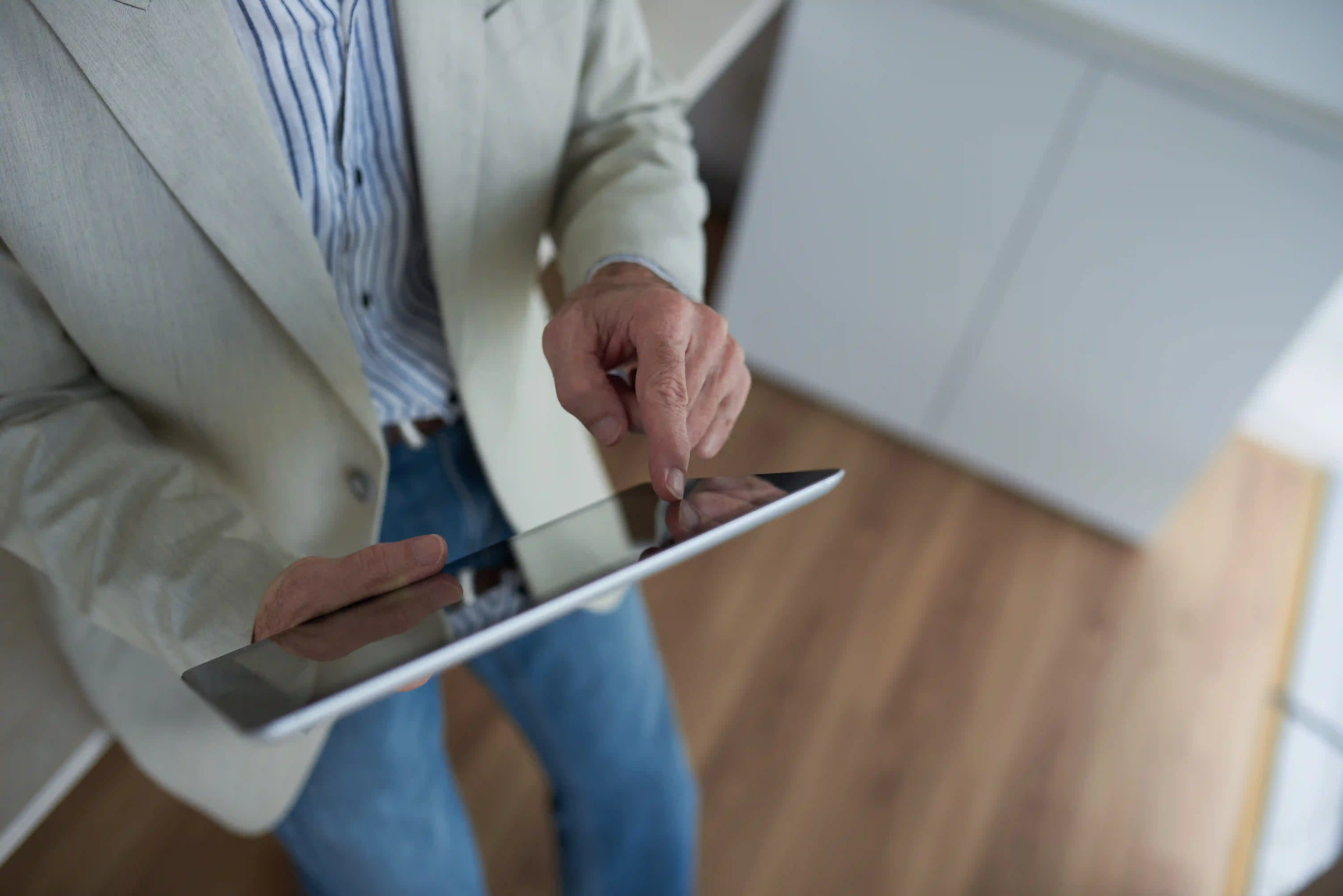 Real estate agent digital presence checklist reviewed on tablet.